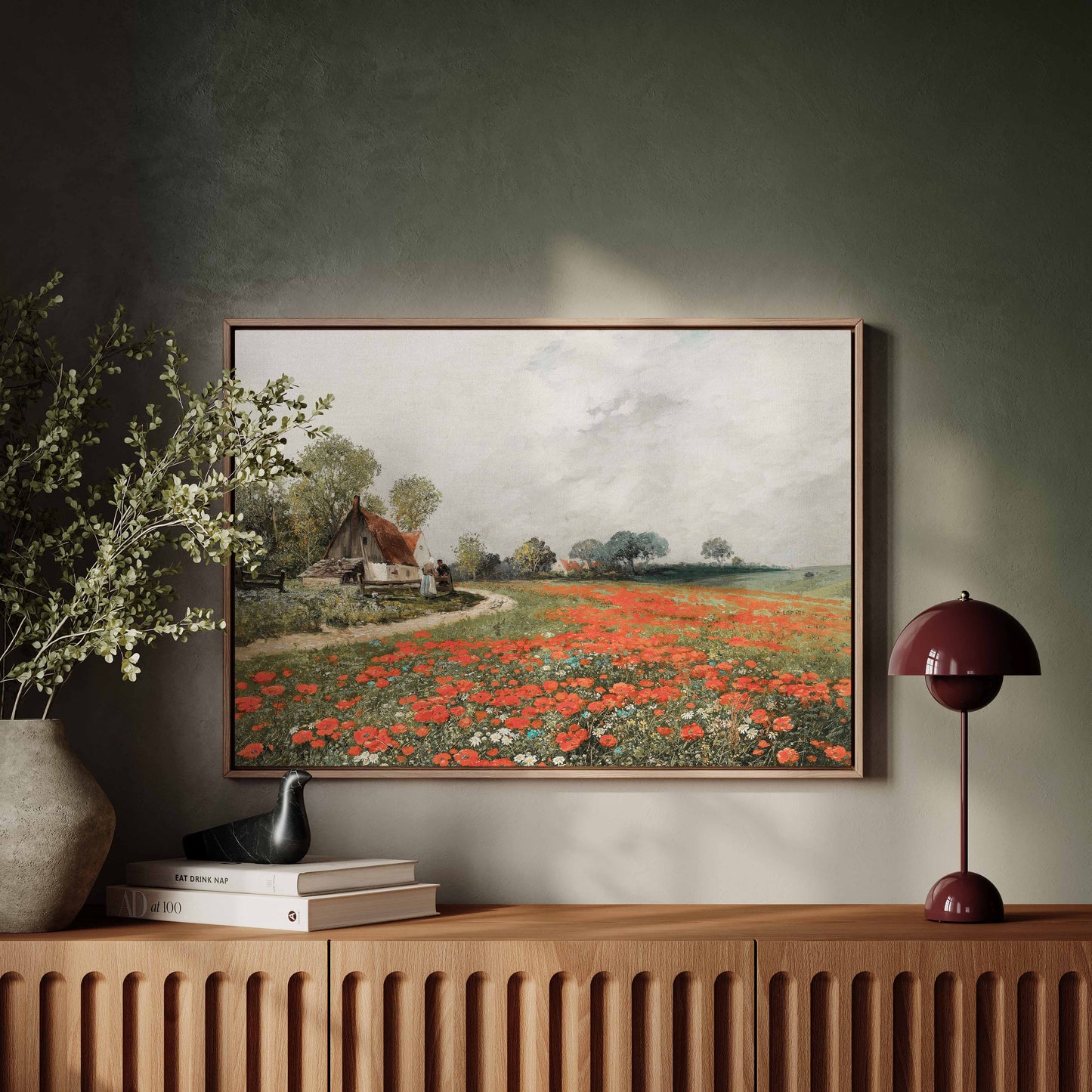 Exklusiv inramad canvastavla i stort format. Landskapsmotiv av sommaräng med röda vildblommor.